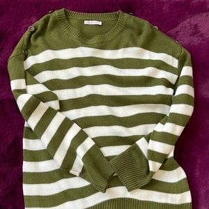Green and white striped sweater